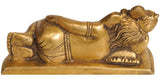 Reclining Ganesha brass statue with carved torso, patterned base, side view, 6 inch