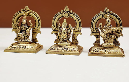 Set of three small brass statues of Ganesha, Lakshmi, and Saraswati 2 inches