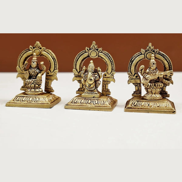 Brass Set of three small statues of Ganesha, Lakshmi, and Saraswati (Height: 2 inches) Entryway Setting