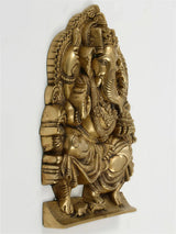 Natural brass Ganesha idol side view, seated on throne, 11 inch
