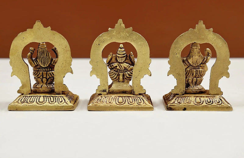 Set of three small brass statues of Ganesha, Lakshmi, and Saraswati 2 inches