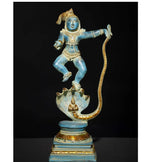 Blue and gold brass Krishna statue, standing atop multi-hood serpent head