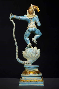 Blue and gold brass Krishna statue, arms extended on coiled serpent base