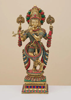 Brass Krishna playing flute sculpture, ornate jeweled work and gold crown