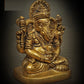 Handmade brass sculpture of a small Ganesha in Shiva Sadhana holding a Shiva Linga 2 Inches