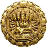 Brass five-headed Ganesha relief wall plate, detailed faces and halo frame