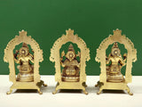 Brass trio statue set: rear view of Ganesha, Lakshmi and Saraswati, ornate frames