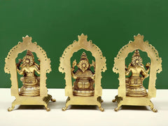 Brass trio statue set: rear view of Ganesha, Lakshmi and Saraswati, ornate frames