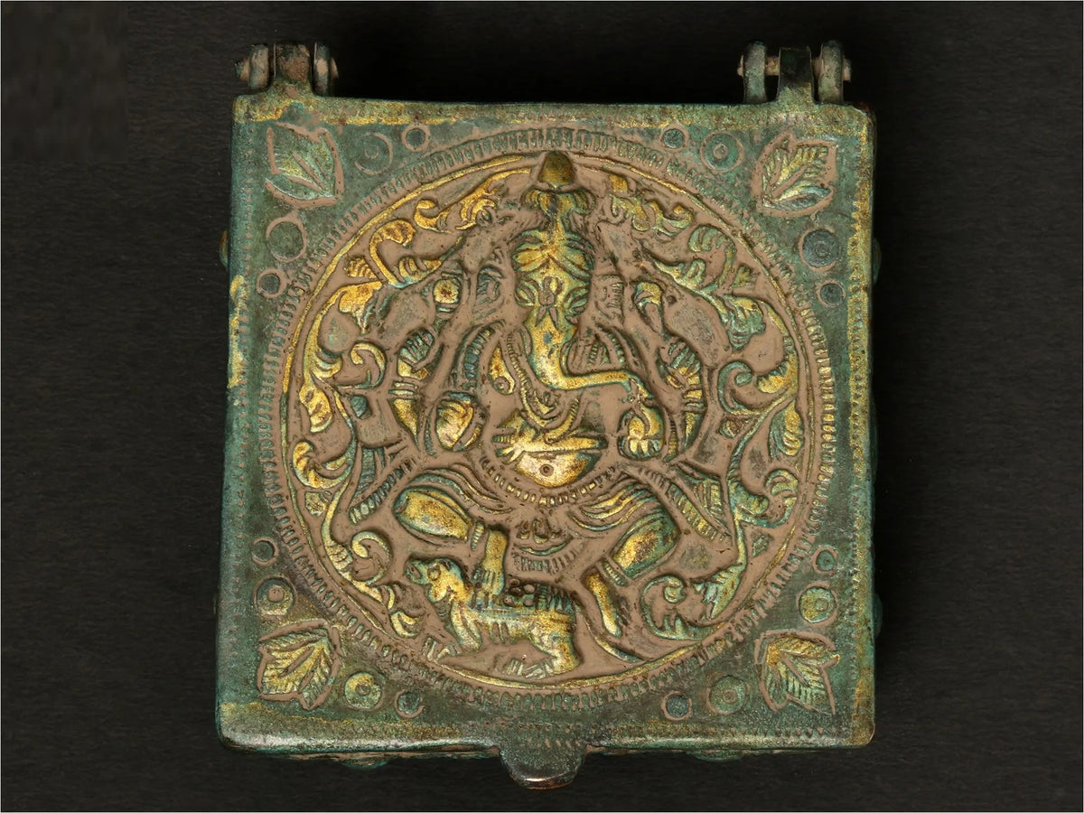 Brass Lord Ganesha box, antique green with raised lid medallion