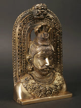 AONA brass Lord Shiva head idol with kirtimukha, detailed facial features, arched frame