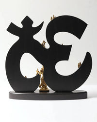Brass Dashavatara statues on black Om-shaped wooden frame, round base