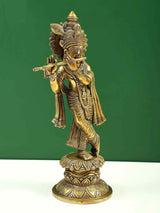 Brass Krishna statue standing, flute to lips, raised hand, engraved base