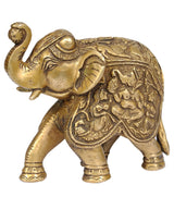 Brass elephant figurine with upraised trunk, carved Ganesh and Riddhi Siddhi details