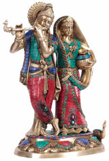 AONA 16-inch Radha Krishna brass statue, standing poses in teal and red mosaic robes.