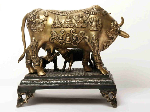 Statue of Kamadhenu Cow and Calf with Baby Krishna and a Peacock 15 inches. Entryway Setting