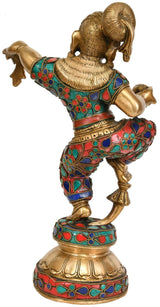 Brass dancing baby Krishna figurine, side pose, blue red green enamel details on clothing
