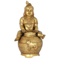 Handmade brass Murali Krishna statue sitting, ornate jewelry, carved pot base