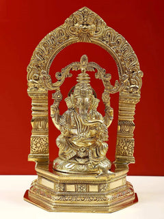 Brass Lord Ganesha idol with kirtimukha arch on pedestal, 9-inch