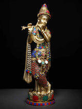 Lord Krishna holding flute figure statue with colorful gemwork on gold base