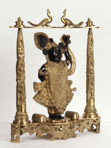 Brass Shrinath Ji statue, side view with raised arm, decorative base, 18-inch height