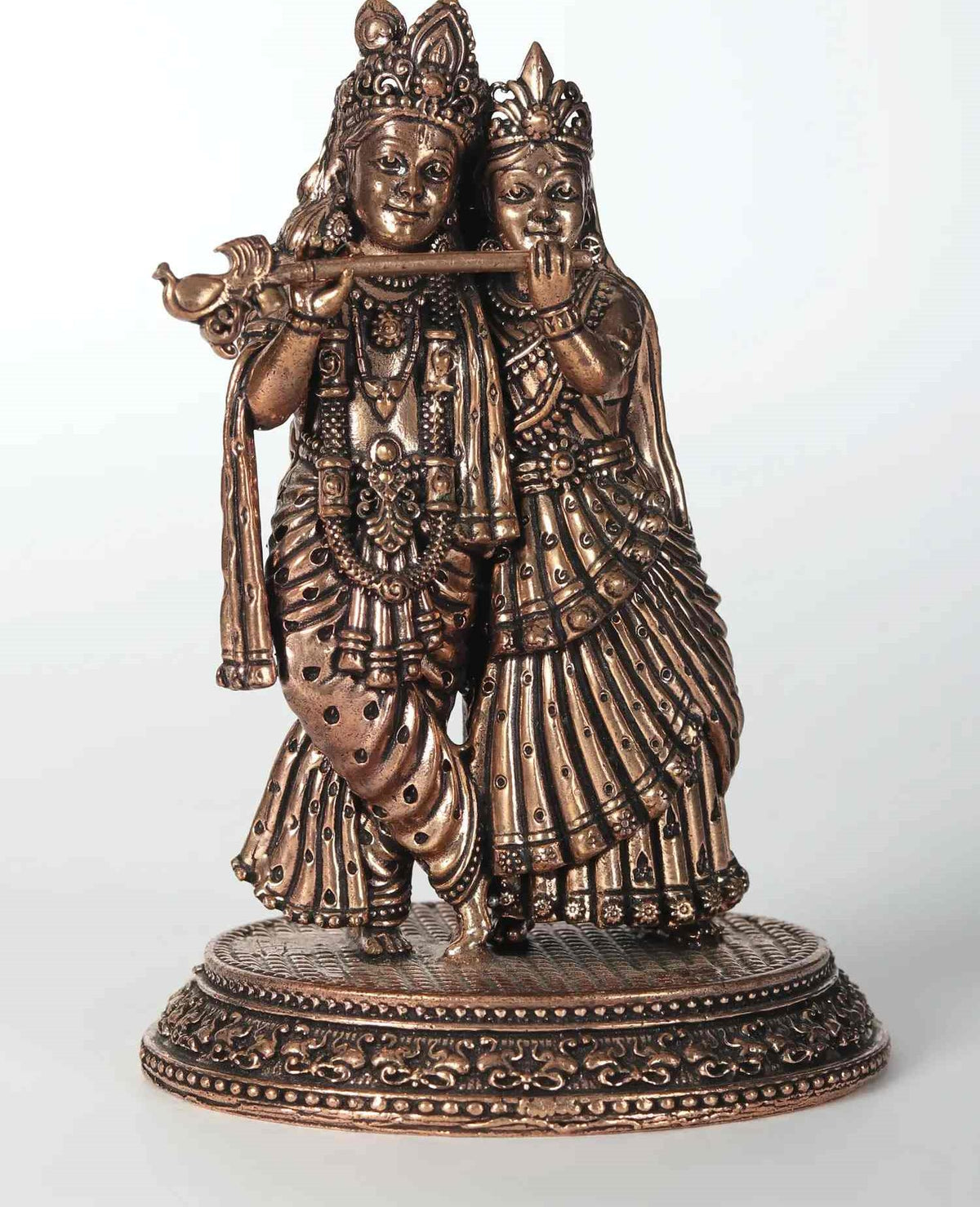 AONA small rose-gold brass Radha-Krishna statue, front view with flute