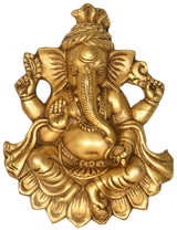 Brass wall hanging of Ganesha seated in Kamalasana, ornate details, 10 in