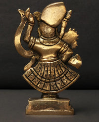 Brass Shrinathji idol, side view with circular back plate and patterned skirt