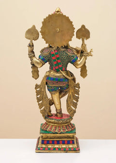 Brass Krishna back view, flute in hand, detailed waist ornaments and jeweled band