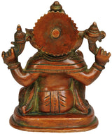 5 inch brass Ganesha statue rear view with round halo disc and raised arms