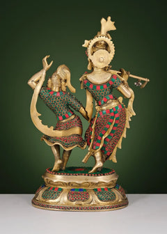 Brass Radha-Krishna dancing sculpture with ornate crowns and jeweled inlay details