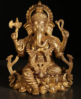 Brass Ganesha statue seated in Kamalasana pose, raised hands, ornate details