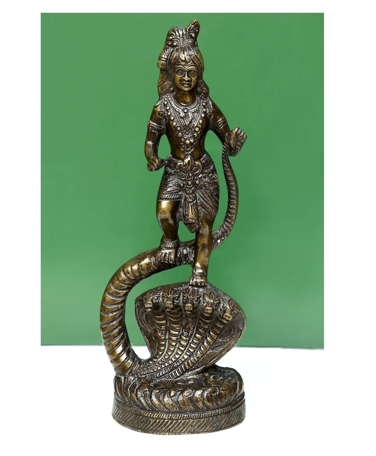 Brass Kaliya Krishna figurine (15 cm), standing on coiled serpent base