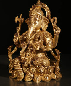 Brass Ganesha statue seated, blessing hand gesture, ornate headdress and robe