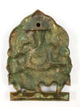 Back view of green and gold Lord Ganesha idol with hanging hole