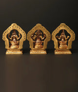 Brass trio statues rear view, arched frames with dotted detailing