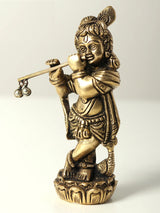 Bal Krishna brass idol standing and playing flute, ornate base and hanging flute ornaments