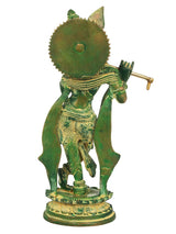 Green brass Krishna statue back view, ornate headdress and flute, 11 inches