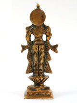 Back view of Radha Ji antique brass statue with gold-toned engraved details