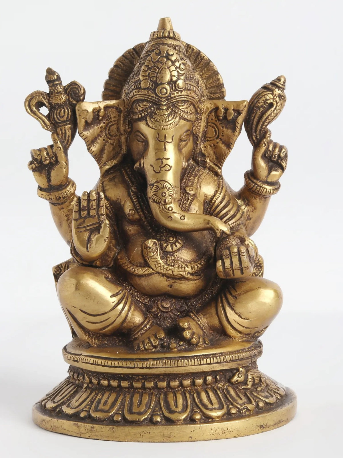Brass seated four-armed Ganesha statue with raised hand in abhaya gesture, 8 in