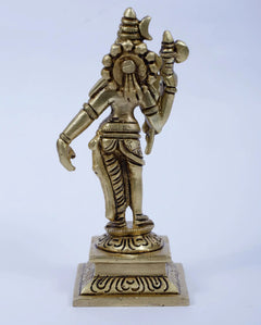 Small Ardhanarishvara brass statue, side view with detailed ornaments and trident, standing