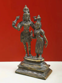 Brass Lord Shiva and Goddess Parvati standing together on ornate pedestal, 8-inch