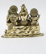 Brass statue base and seated Lord Shiva family figures, 5 in, ornate circular backrests.
