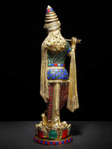Back view Lord Krishna flute statue with ornate gold robe and jeweled panel