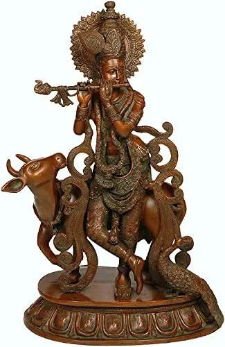 Large brass Krishna flute sculpture with cow and peacock, 21 in