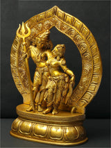 Shiva & Parvati brass statue; Shiva with raised trident beside Parvati