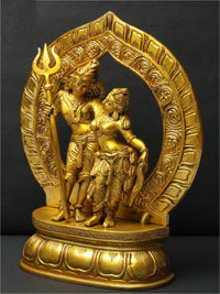 Shiva & Parvati brass statue; Shiva with raised trident beside Parvati