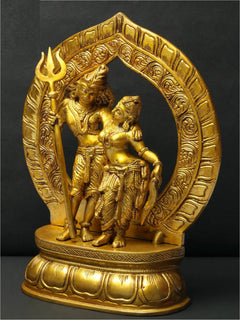 Shiva & Parvati brass statue; Shiva with raised trident beside Parvati
