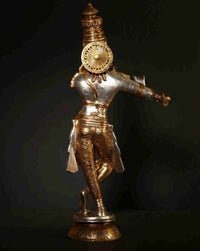 Silver and gold Krishna flute statue, rear view with circular ornament