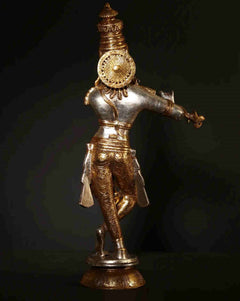 Silver and gold Krishna flute statue, rear view with circular ornament