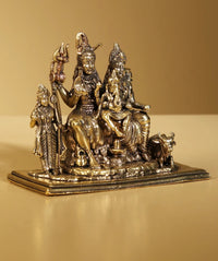 Brass Shiva family idol on base, 4-inch, multi-figure seated deity with attendants